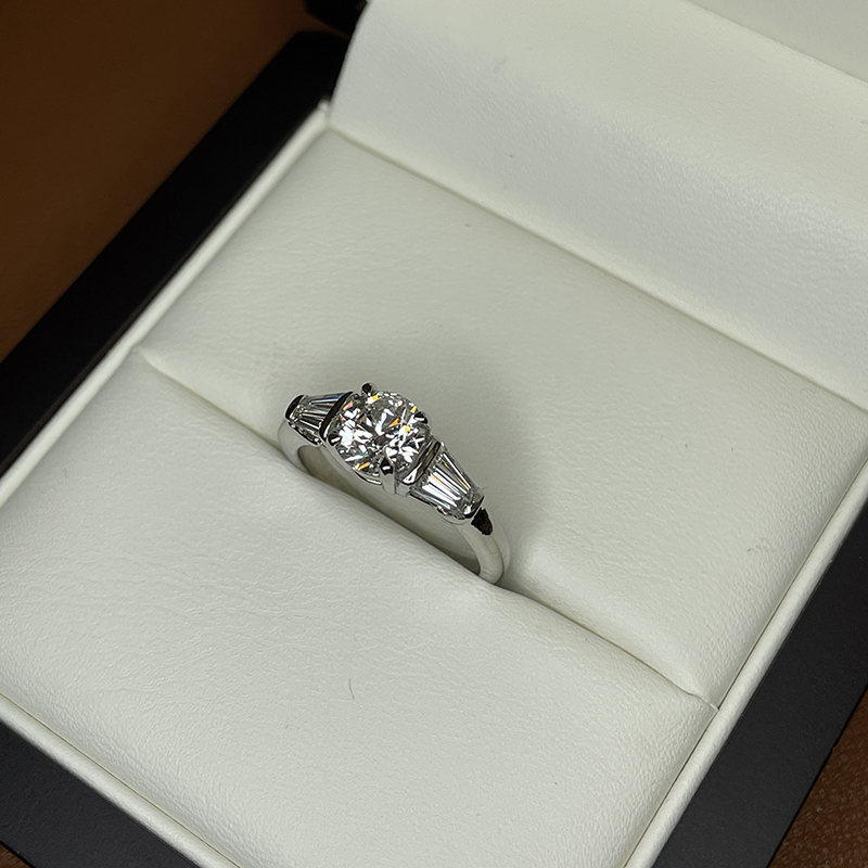 Round Shape And Tapered Baguettes Lab Grown Diamond Engagement Ring ...
